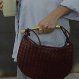 Woven Crescent Handle Statement Bag