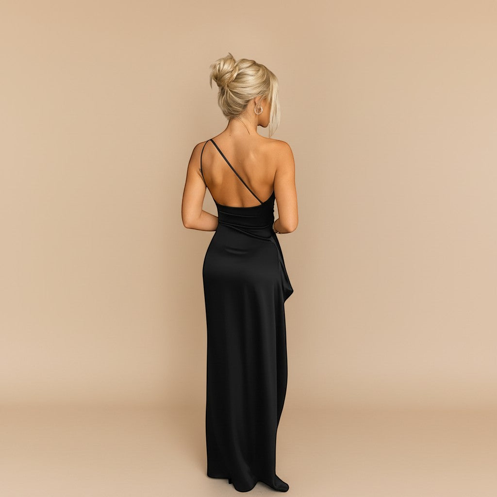 Yemelia black one shoulder draped evening gown with high slit and floor-length silhouette.