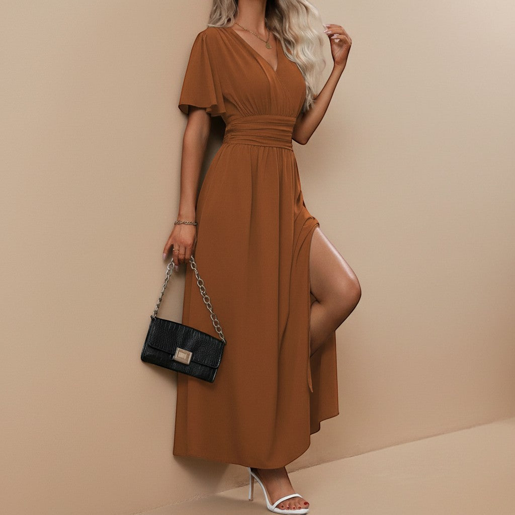 Yemelia brown V-neck flutter sleeve maxi dress with defined waist and high leg slit. Flowing silhouette, ideal for events.