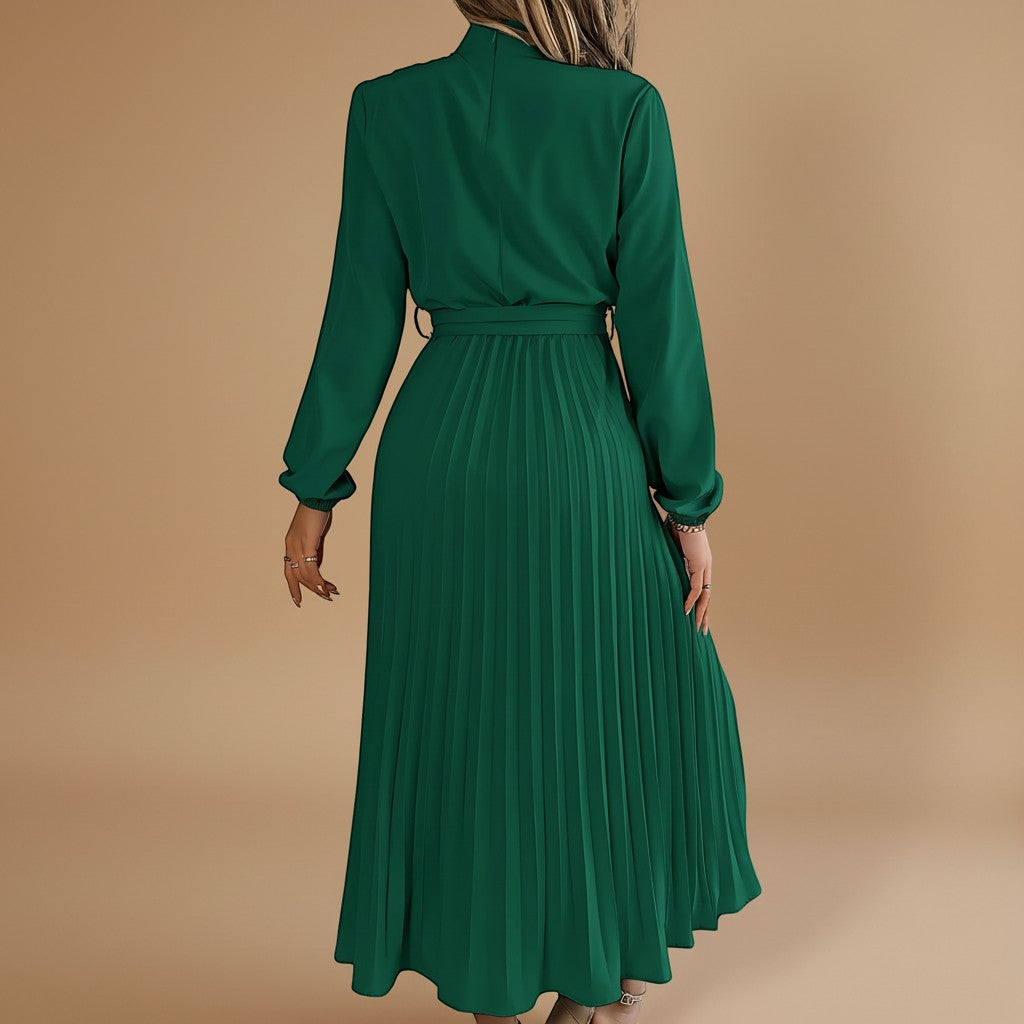Yemelia green long sleeve pleated midi dress with high neck and waist tie. Elegant silhouette for events.