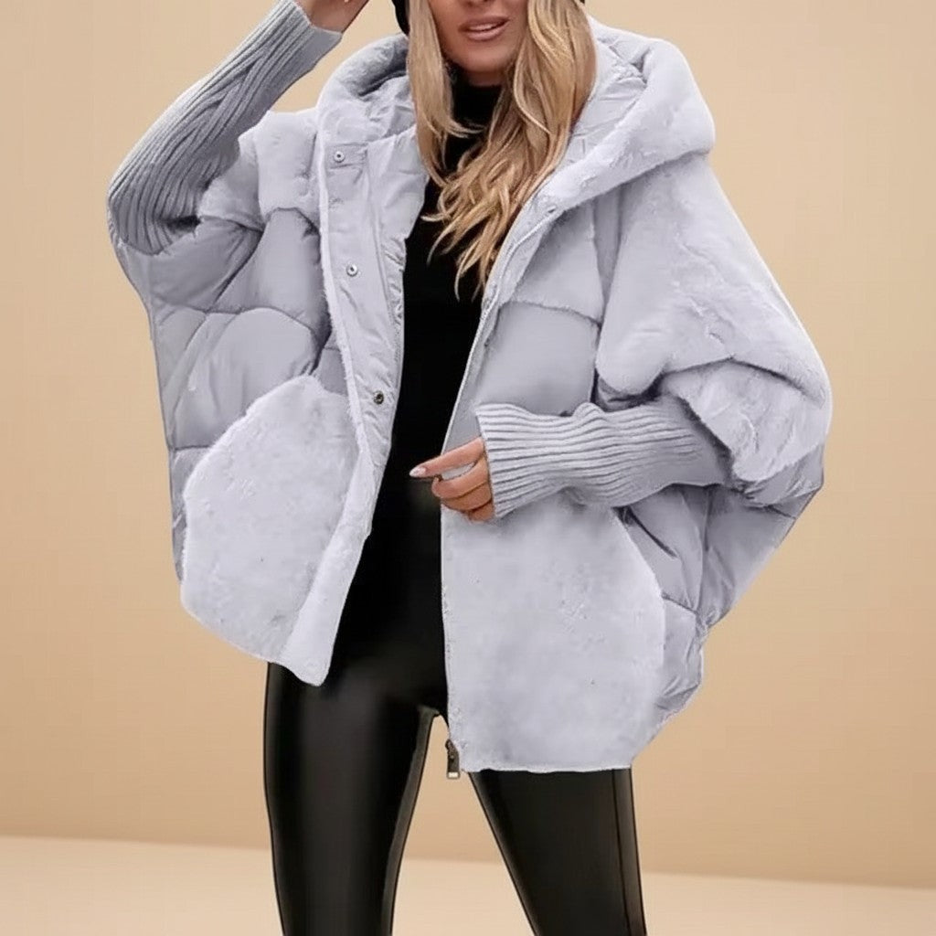 Yemelia light grey oversized hooded puffer jacket with textured finish and ribbed cuffs.