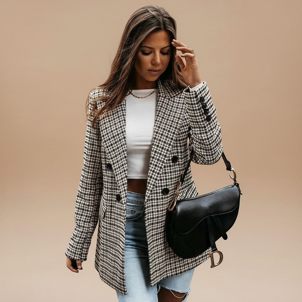 Yemelia double-breasted tailored blazer jacket with houndstooth pattern in black and white, featuring notched lapels and button closure.