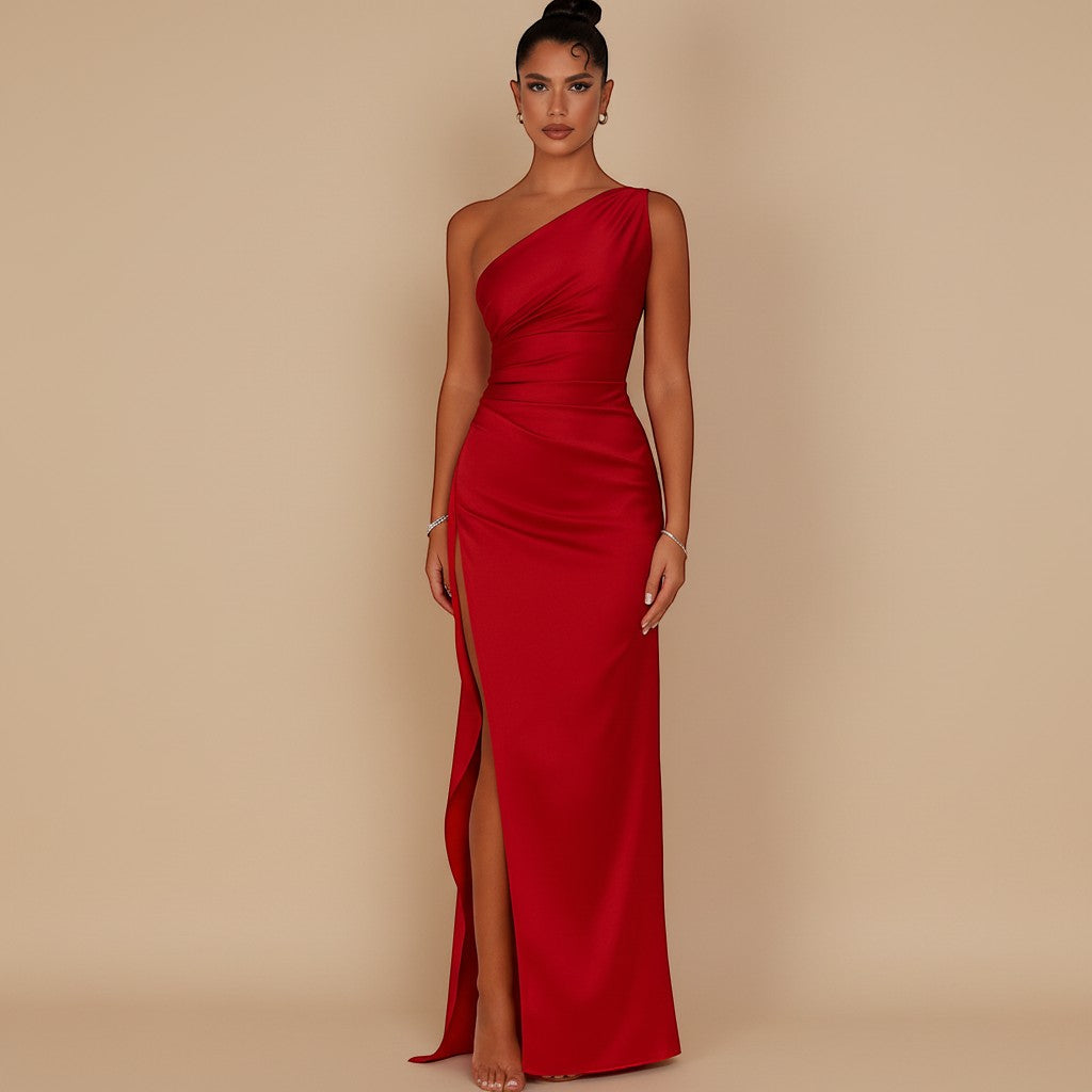 Yemelia red one shoulder draped evening gown with high slit and sculpted fit, floor length.